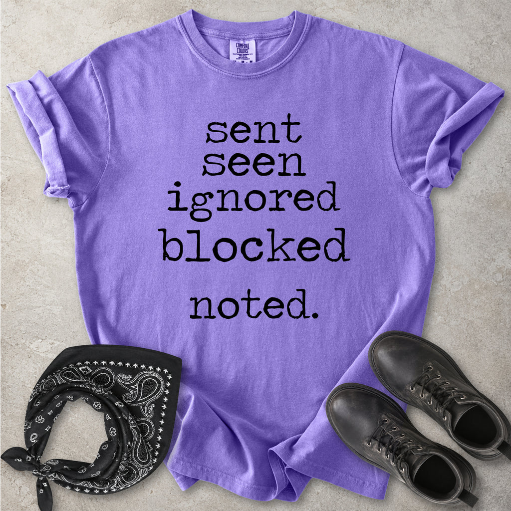 Violet purple Comfort Colors graphic T-shirt with black text reading sent seen ignored blocked noted, styled with black boots and a black bandana