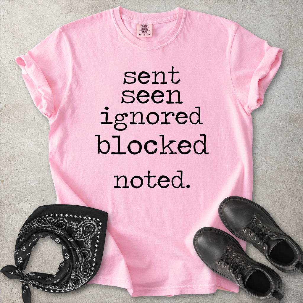 Blossom pink Comfort Colors graphic T-shirt with black text reading sent seen ignored blocked noted, styled with black boots and a black bandana