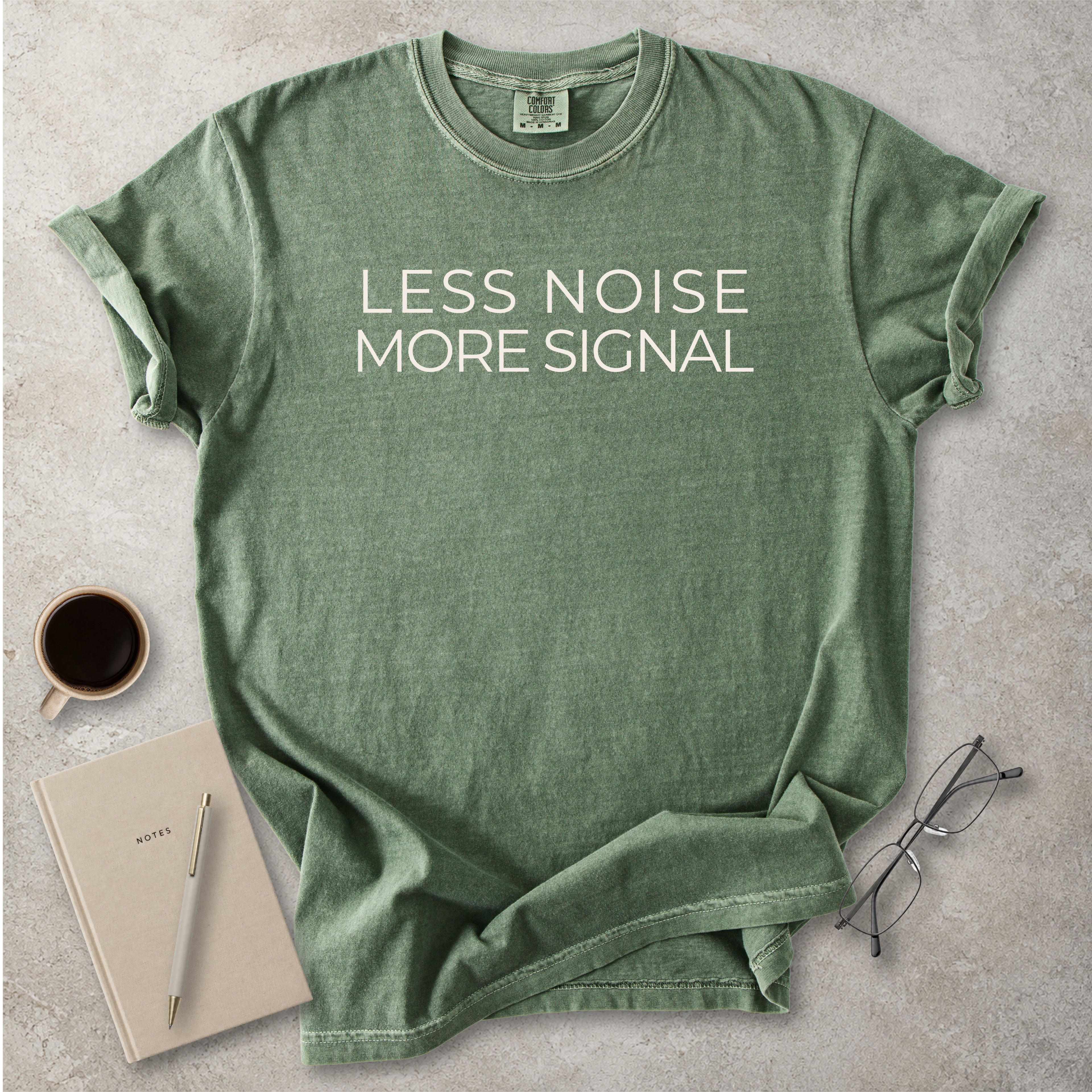 Moss green Comfort Colors graphic T-shirt with black text reading wyd omw brb nvm typical, styled with black boots and a black bandana