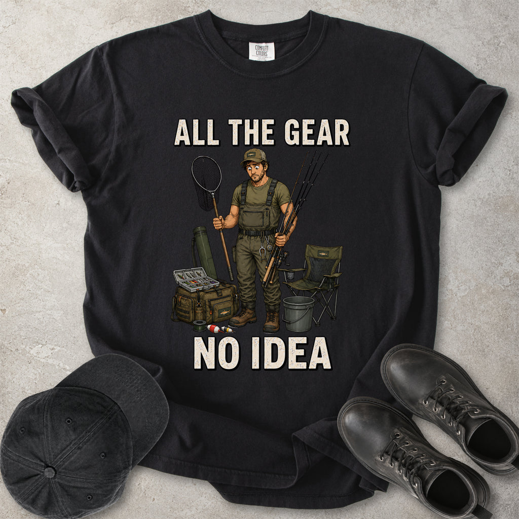 Black Comfort Colors 1717 T-shirt with a funny All the Gear No Idea fishing graphic showing a confused fisherman holding rods and a landing net with fishing gear.