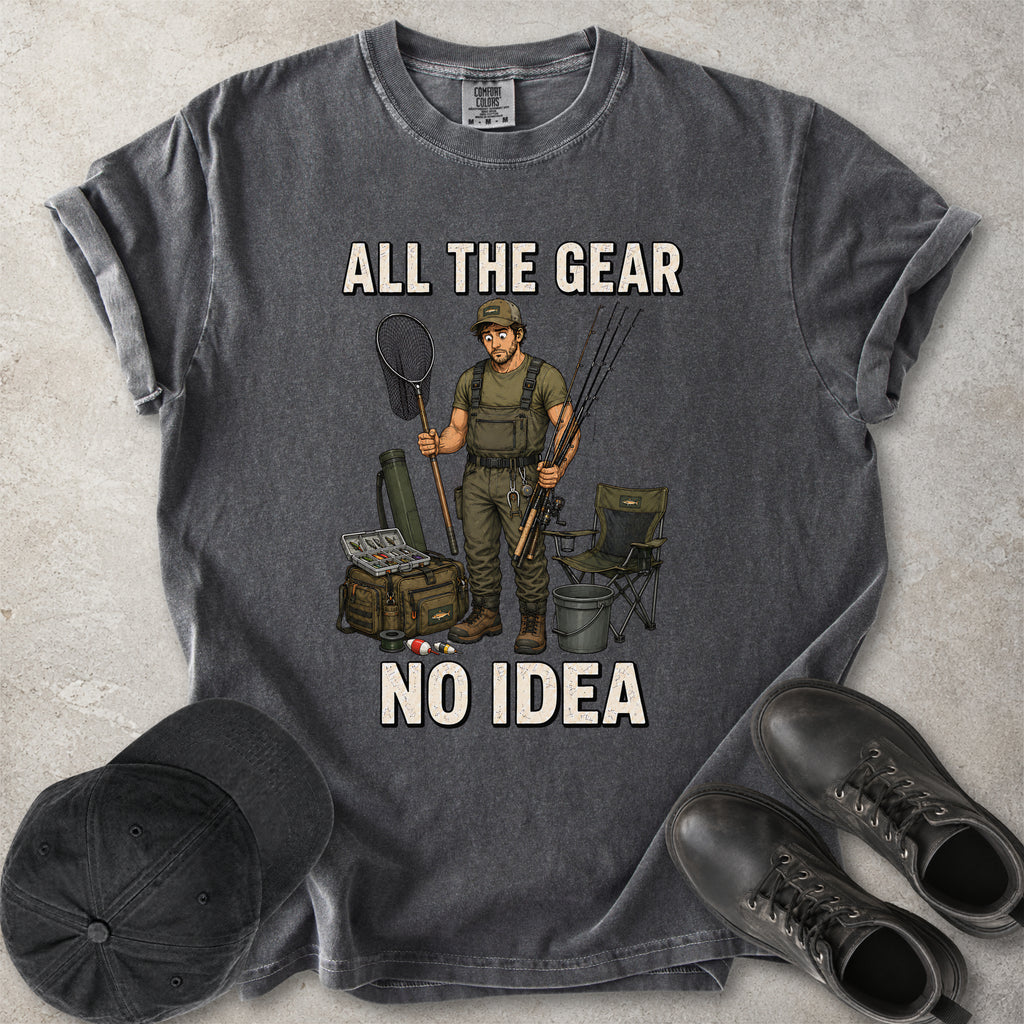 Pepper grey Comfort Colors 1717 T-shirt with a funny All the Gear No Idea fishing graphic showing a confused fisherman holding rods and a landing net with fishing gear.
