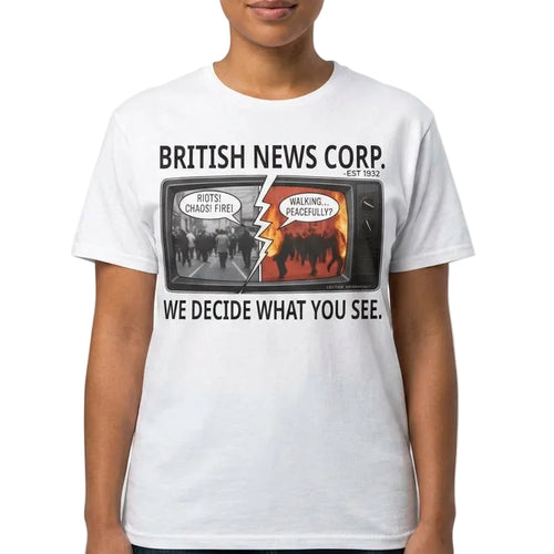 Model wearing a British News Corp media satire tee with split TV news artwork about media bias and headline framing.