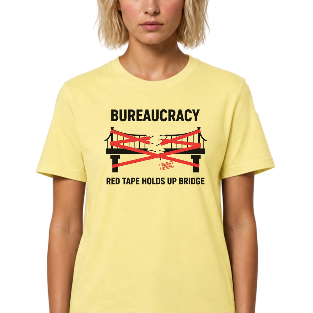 Yellow Cornsilk Gildan 64000 Softstyle T-shirt featuring a satirical bureaucracy graphic with red tape wrapped around a bridge and the text “Bureaucracy” above and “Red Tape Holds Up Bridge” below.