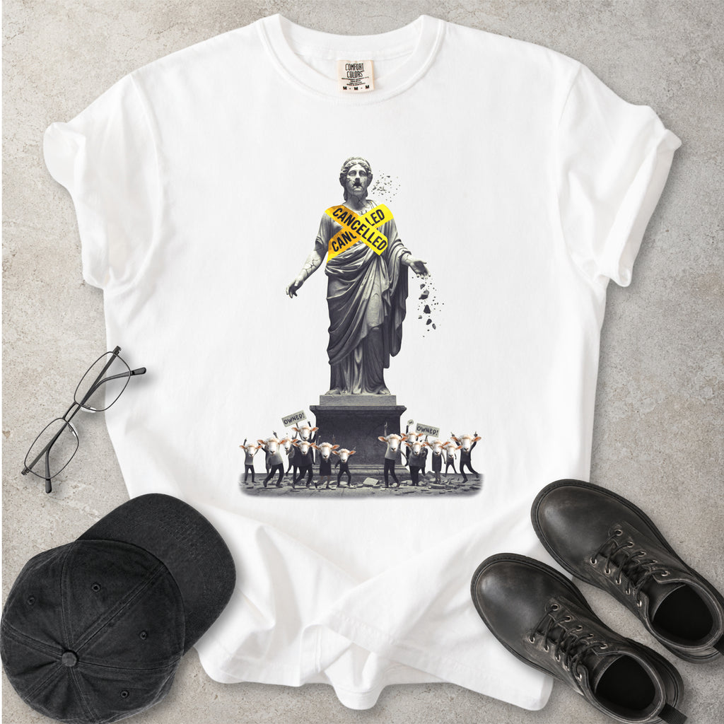 White Comfort Colors graphic T-shirt with cancelled statue and crowd design, styled with black cap, glasses and black boots