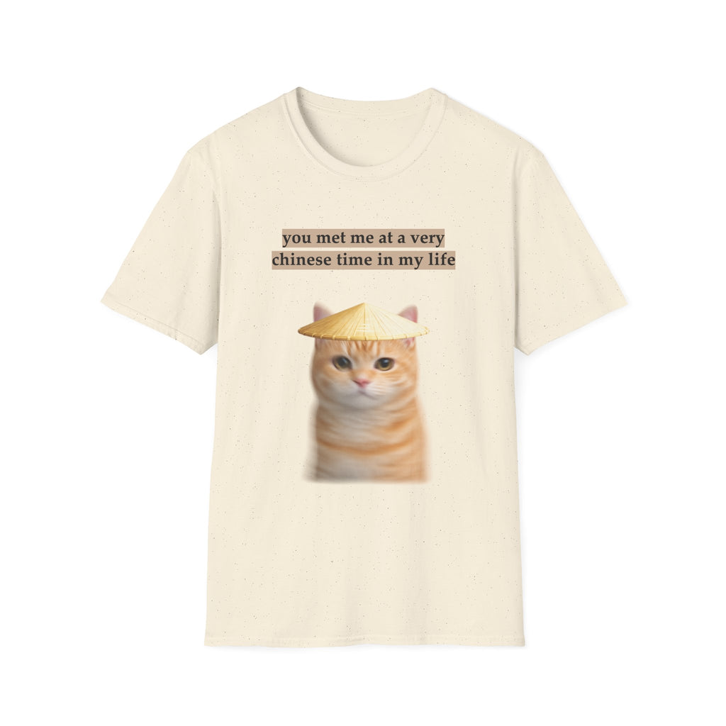 Beige t-shirt with a cat graphic and text on a white background