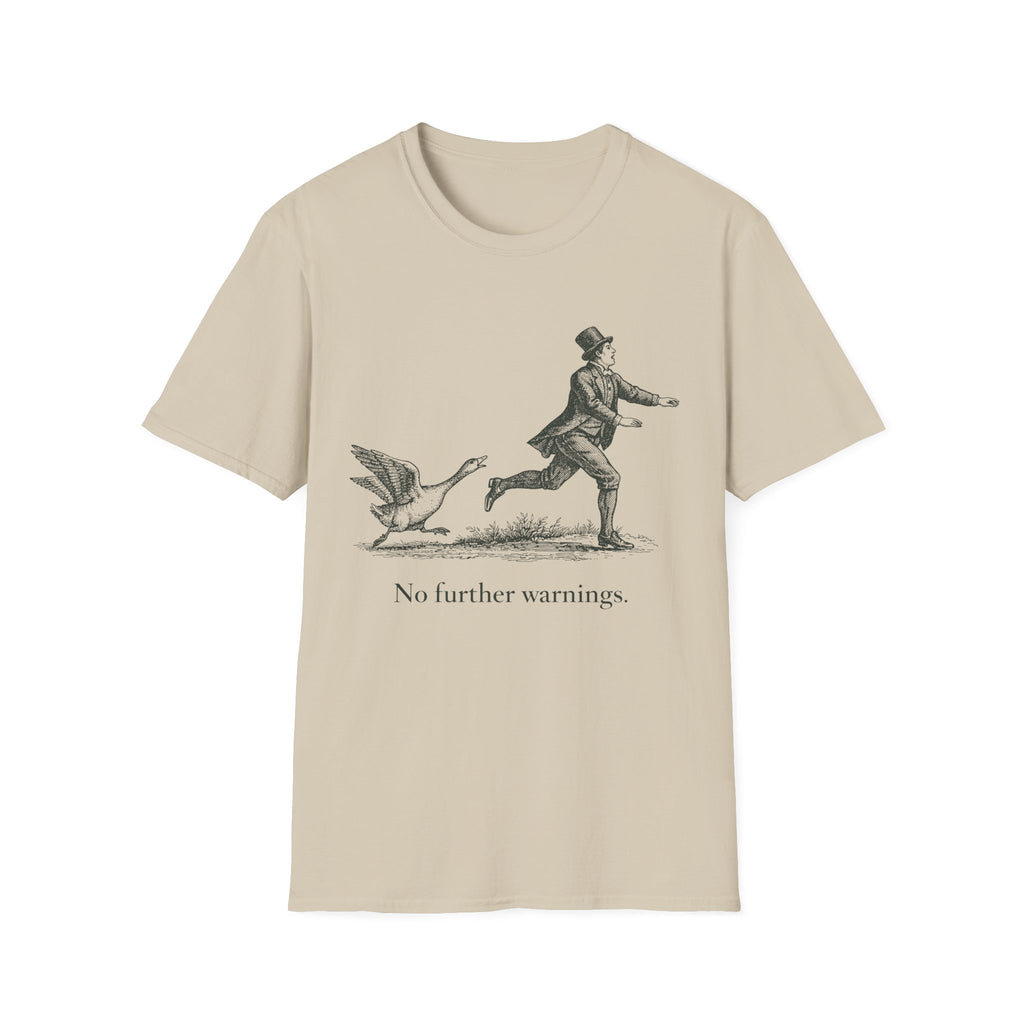 Beige t-shirt with a graphic of a person chasing a duck and text 'No further warnings' on a white background