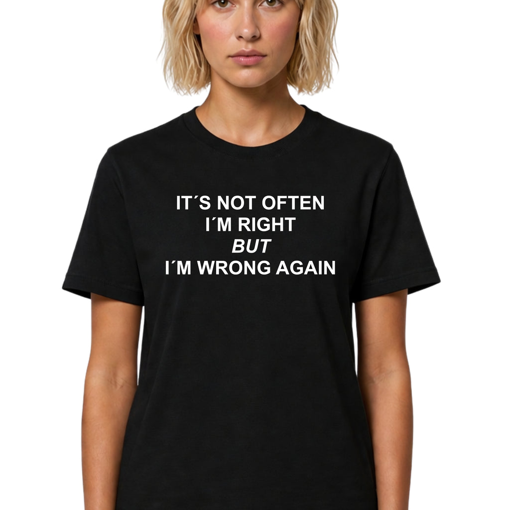 Person wearing a black t-shirt with humorous text on a white background