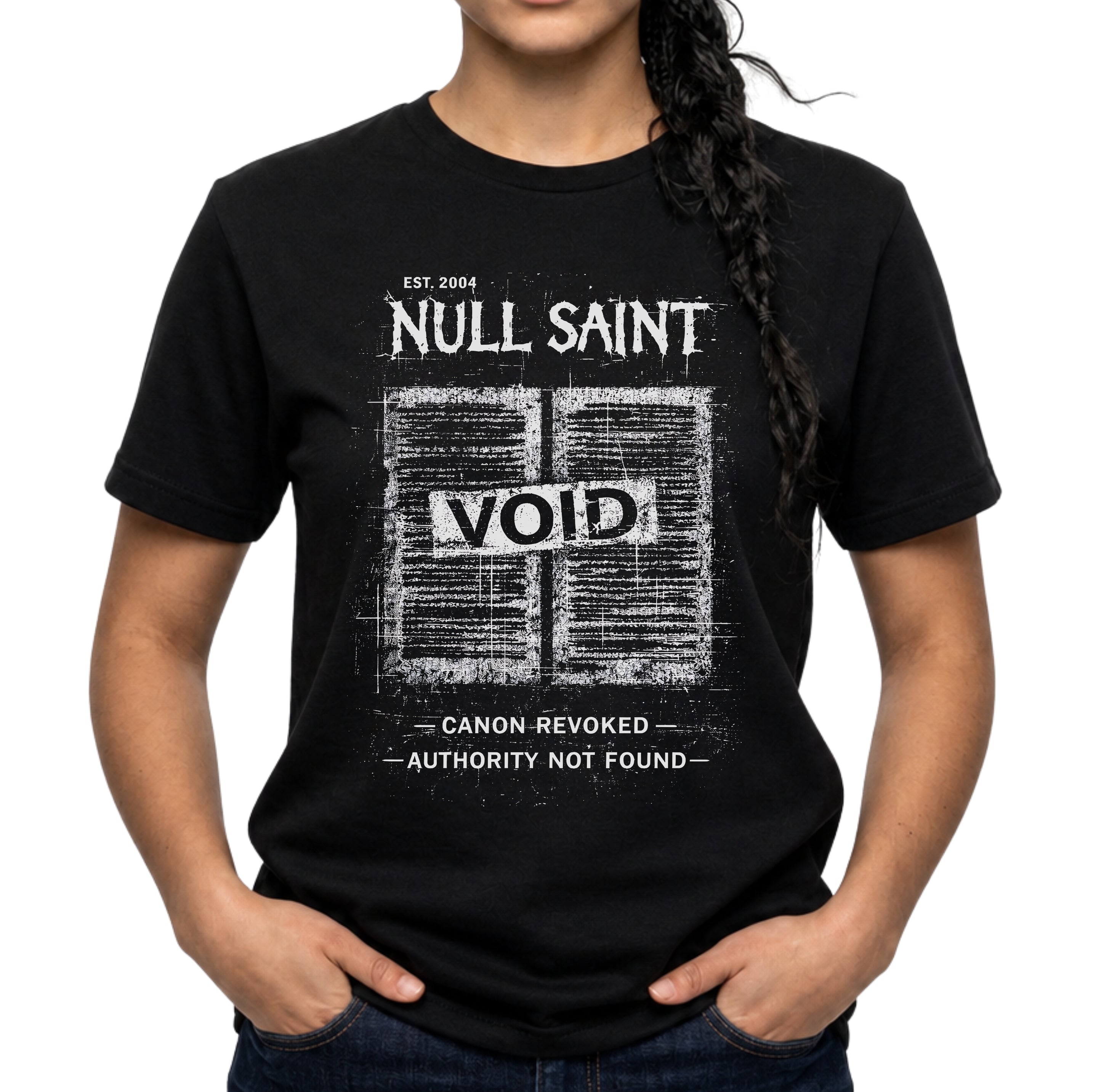 Black Gildan 64000 Softstyle T-shirt featuring a distressed white Null Saint archive graphic with the word “VOID” across the centre and small text reading “canon revoked” and “authority not found.”