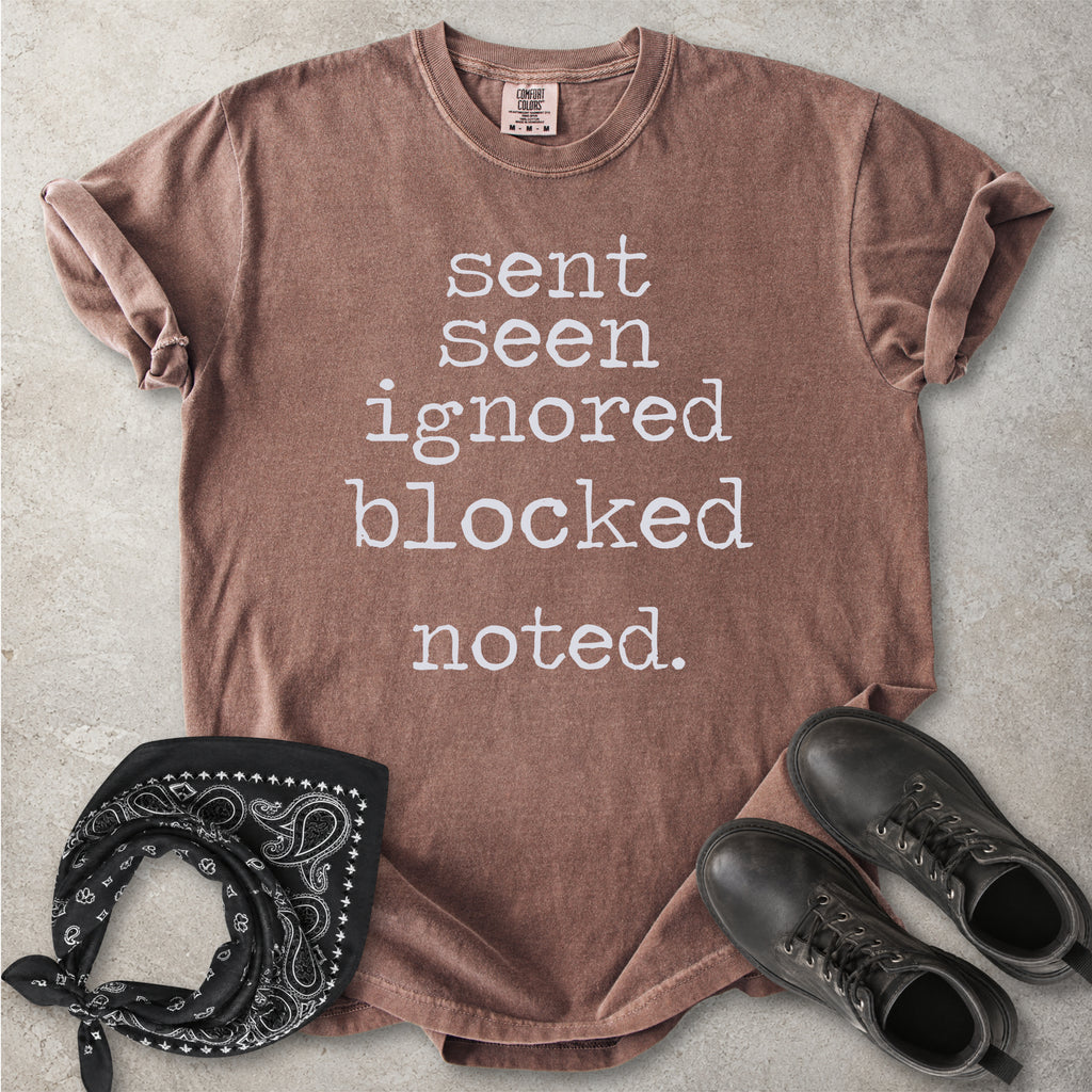 Espresso brown Comfort Colors graphic T-shirt with black text reading sent seen ignored blocked noted, styled with black boots and a black bandana