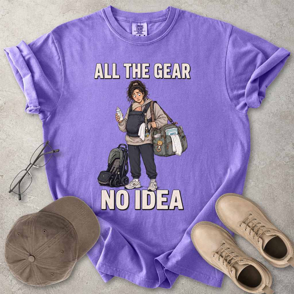 Violet purple Comfort Colors 1717 T-shirt with a funny All the Gear No Idea new mum graphic showing a tired mother carrying a baby, bottle, changing bag and stroller.