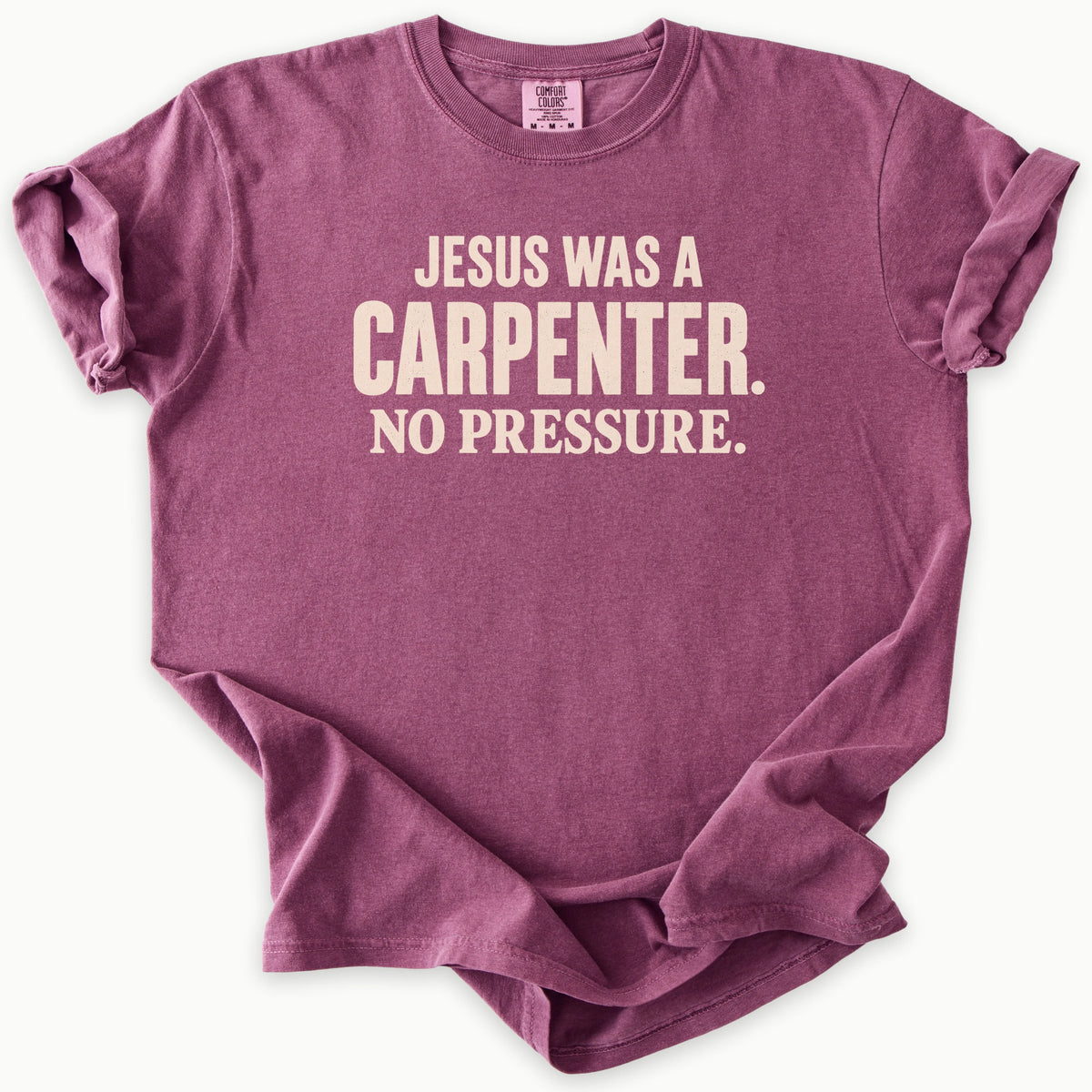 Carpenter T-Shirt in Berry (dusty mauve-berry) — Jesus was a carpenter, no pressure slogan, funny Christian humor, Comfort Colors 1717 unisex christian faith tee