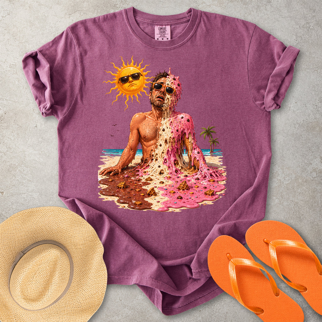Purple Comfort Colors graphic T-shirt with a melting ice cream man on a sunny beach, styled with straw hat and orange flip flops