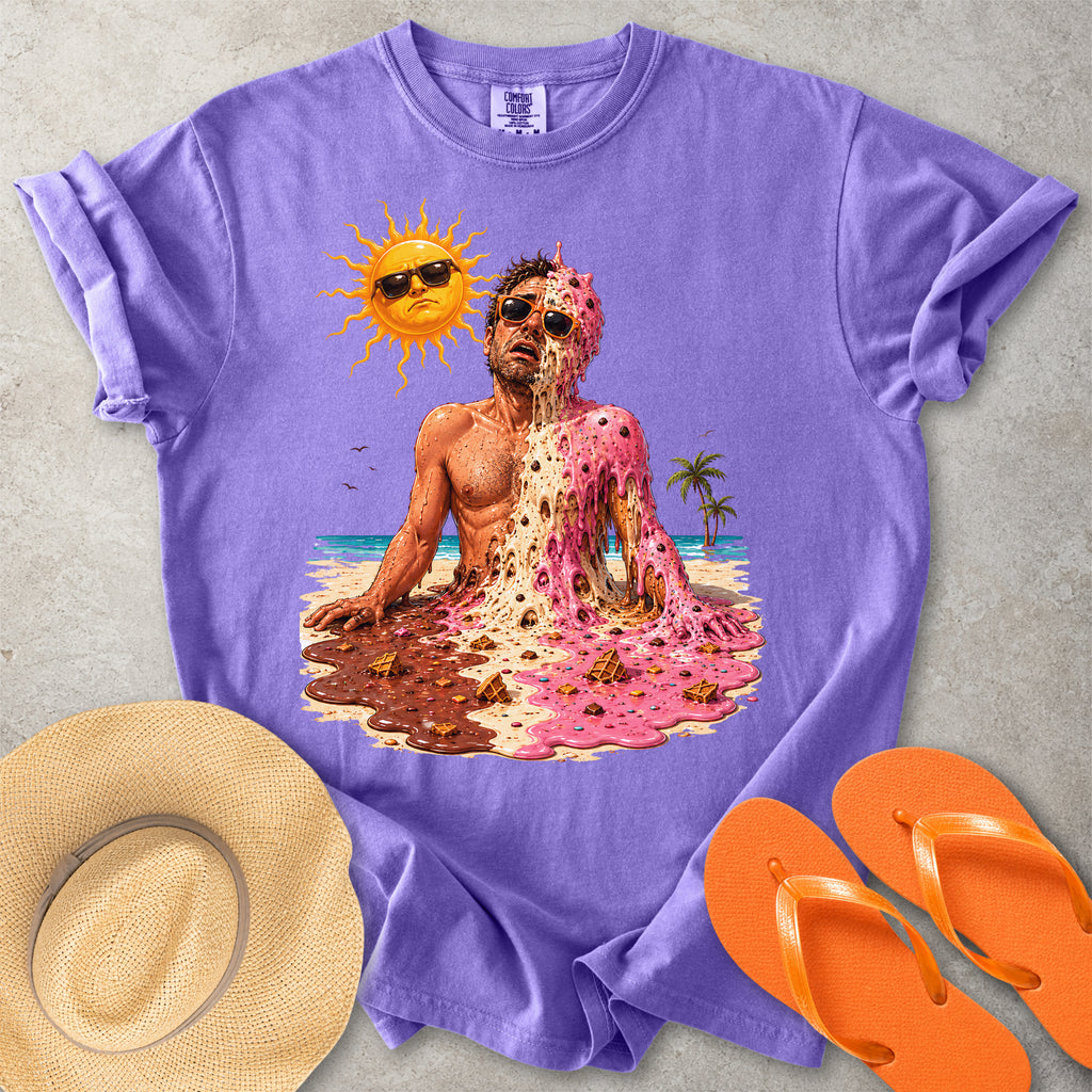 Purple Comfort Colors graphic T-shirt with a melting ice cream man on a sunny beach, styled with straw hat and orange flip flops