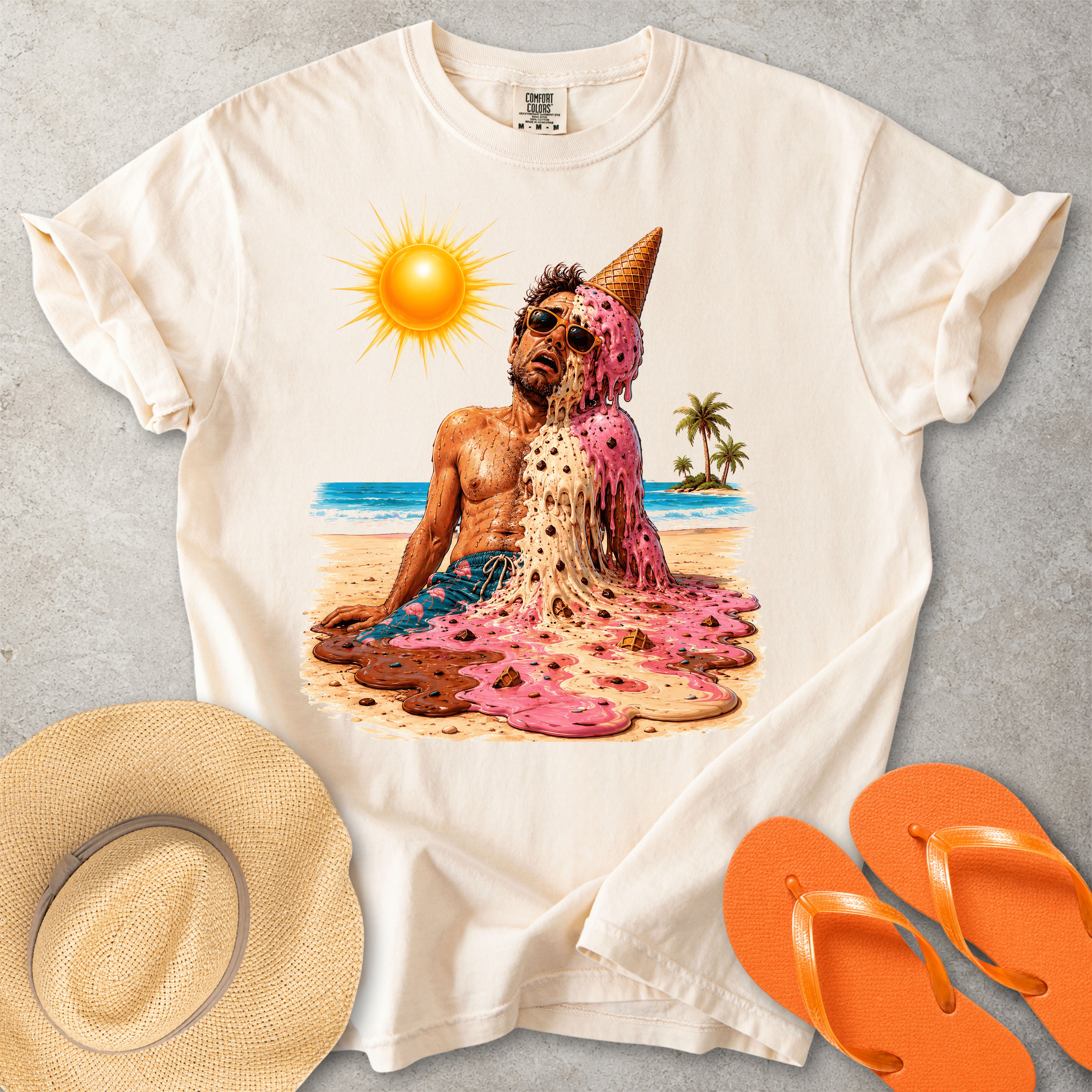 Beige Comfort Colors graphic T-shirt with a melting ice cream man on a sunny beach, styled with straw hat and orange flip flops