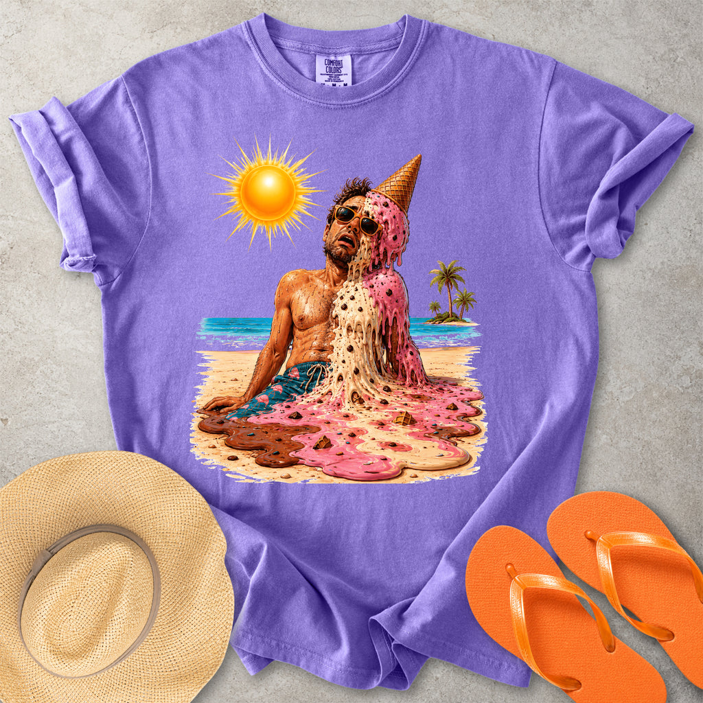 Purple Comfort Colors graphic T-shirt with a melting ice cream man on a sunny beach, styled with straw hat and orange flip flops