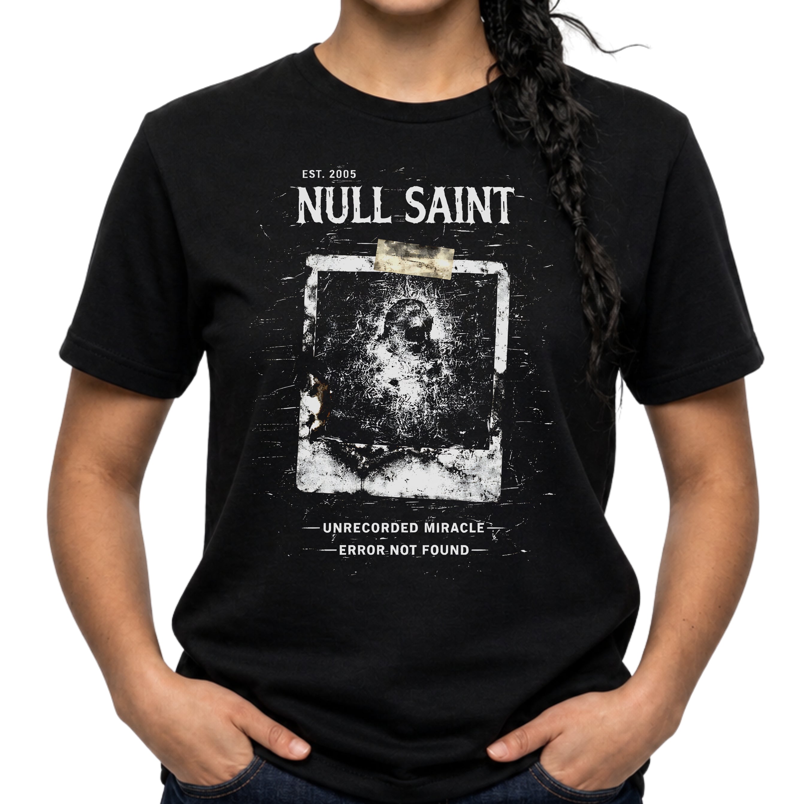 Null Saint archive graphic tee featuring distressed white typography, corrupted photo artwork, and dark underground grunge styling on a black T-shirt.