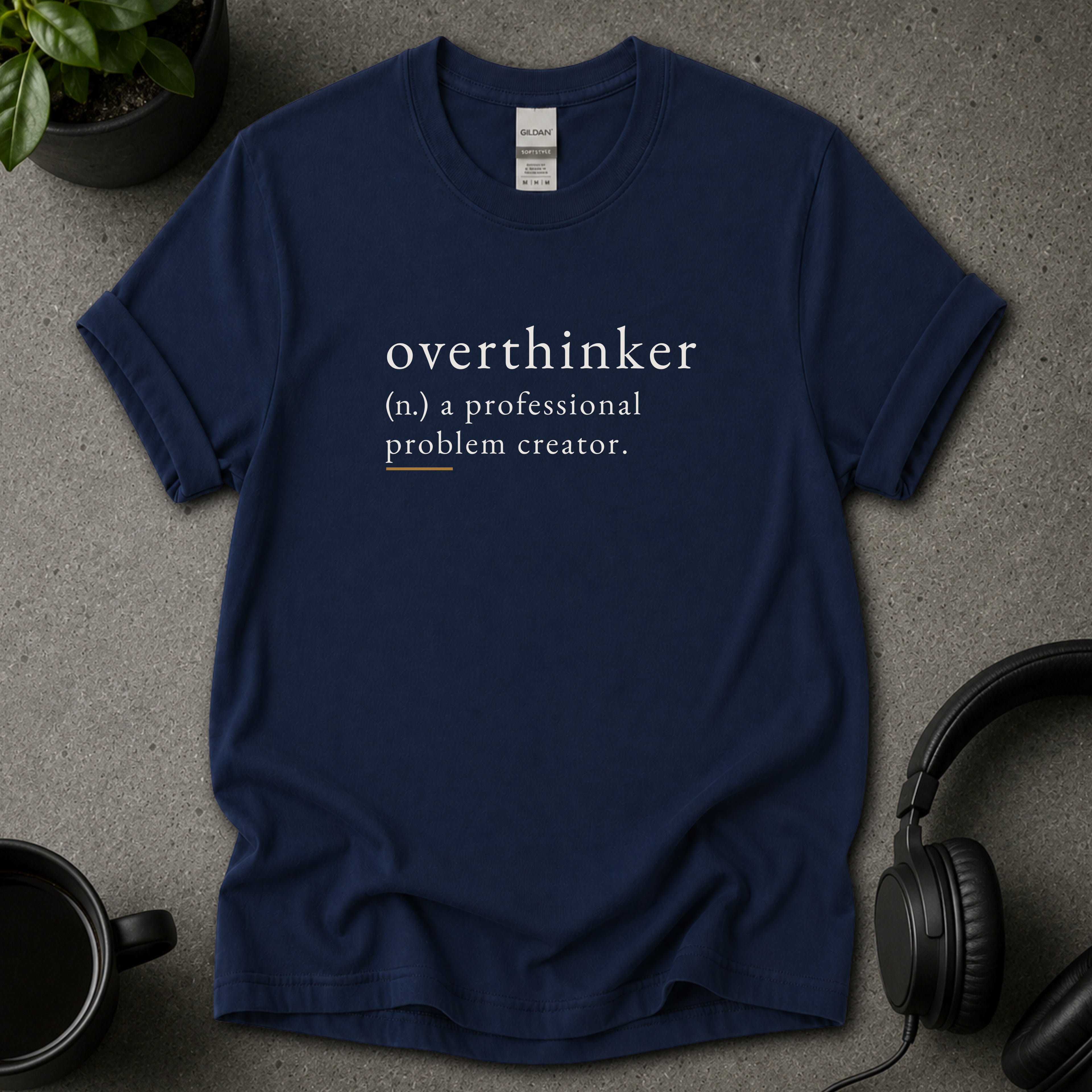 Navy blue Overthinker psychology T-shirt with dictionary-style text reading a professional problem creator