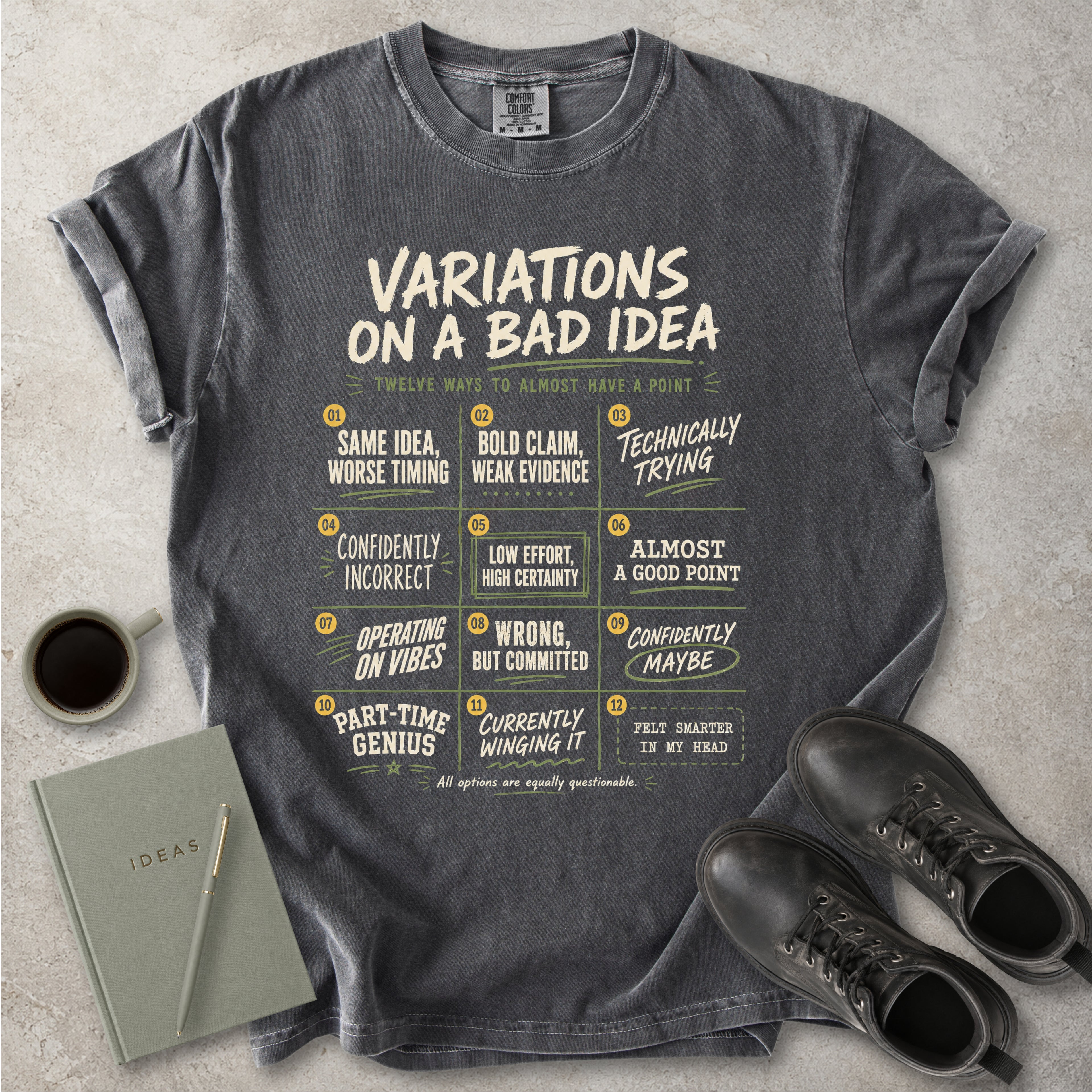 Pepper grey Comfort Colors graphic T-shirt with Variations On A Bad Idea decision chart design, styled with coffee, notebook, pen and black boots